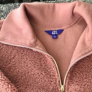 L pink fuzzy throw over